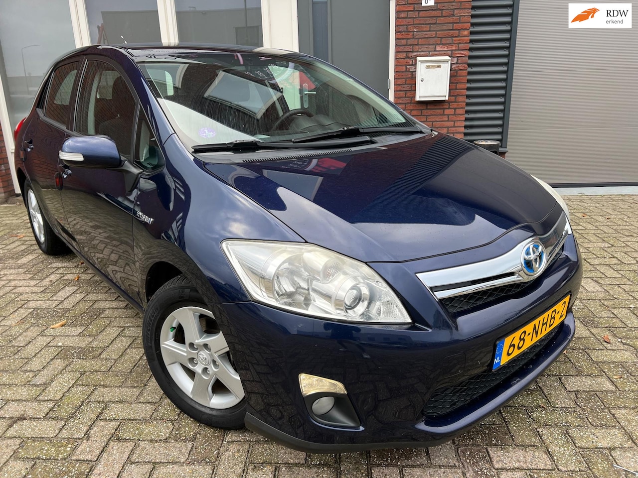 Toyota Auris - 1.8 Full Hybrid Aspiration / 5DRS / Clima / Cruise / NAP - AutoWereld.nl