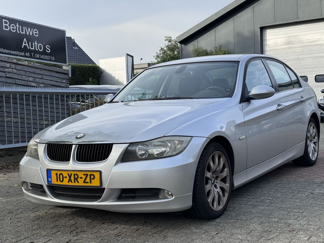 BMW 3-serie - 2.0 318d High Executive - AutoWereld.nl