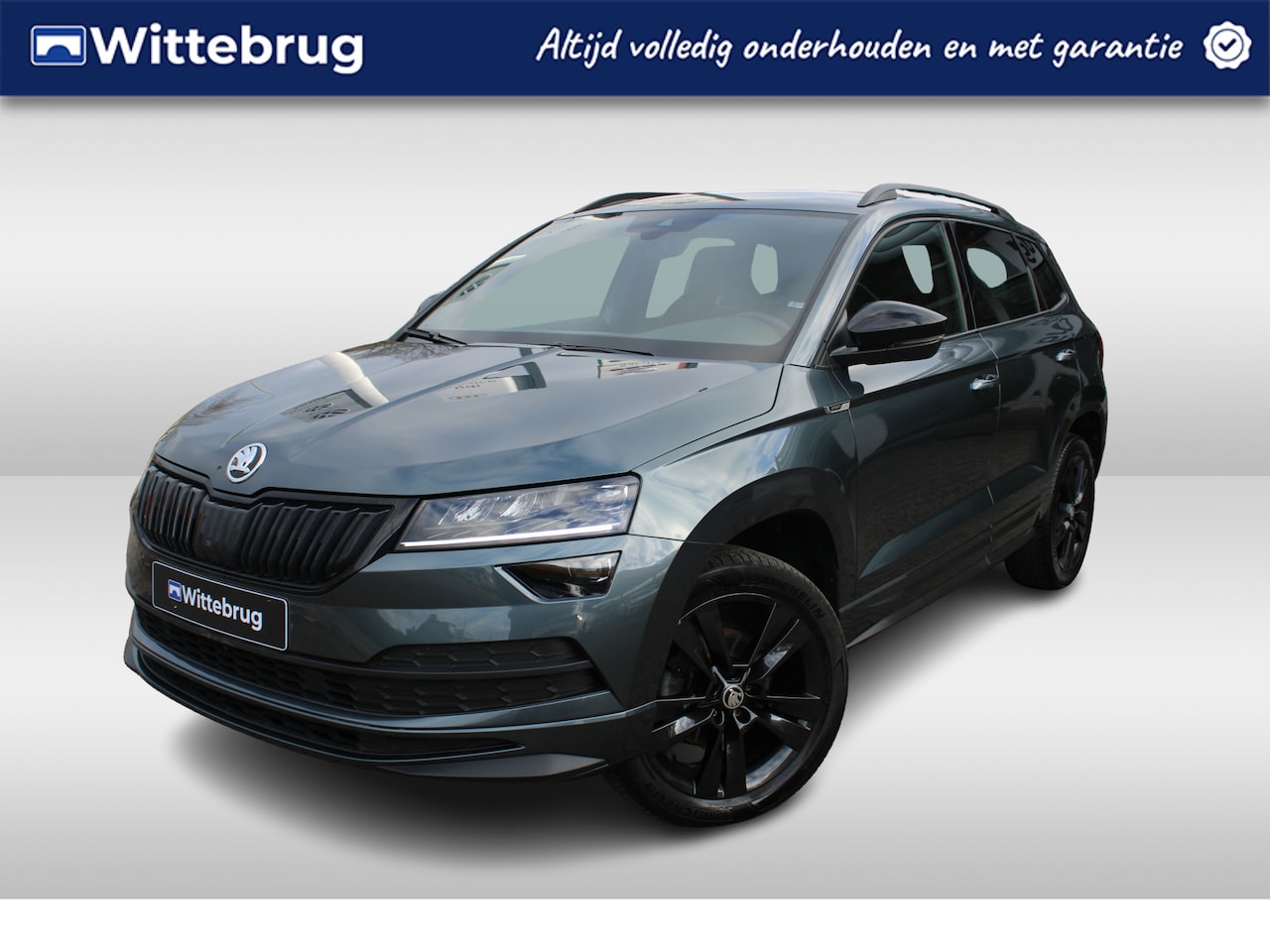 Skoda Karoq - 1.5 TSI ACT 150pk Sportline Navigatie / App Connect / LM 18 inch / Camera / PDC achter / L - AutoWereld.nl