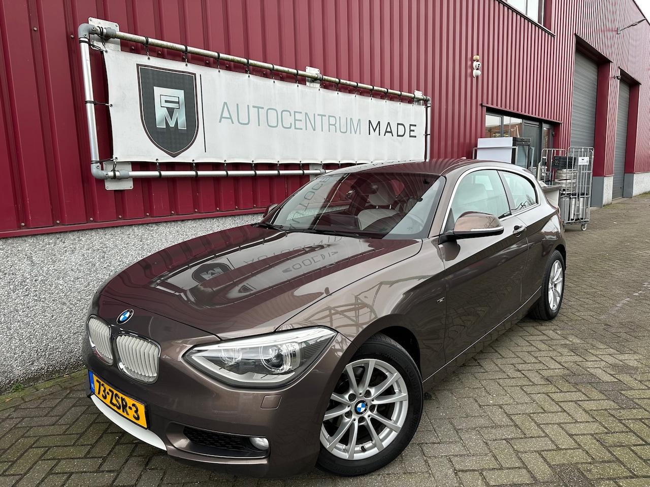 BMW 1-serie - 116i Upgrade Edition // Leer // NAVI // PDC // - AutoWereld.nl