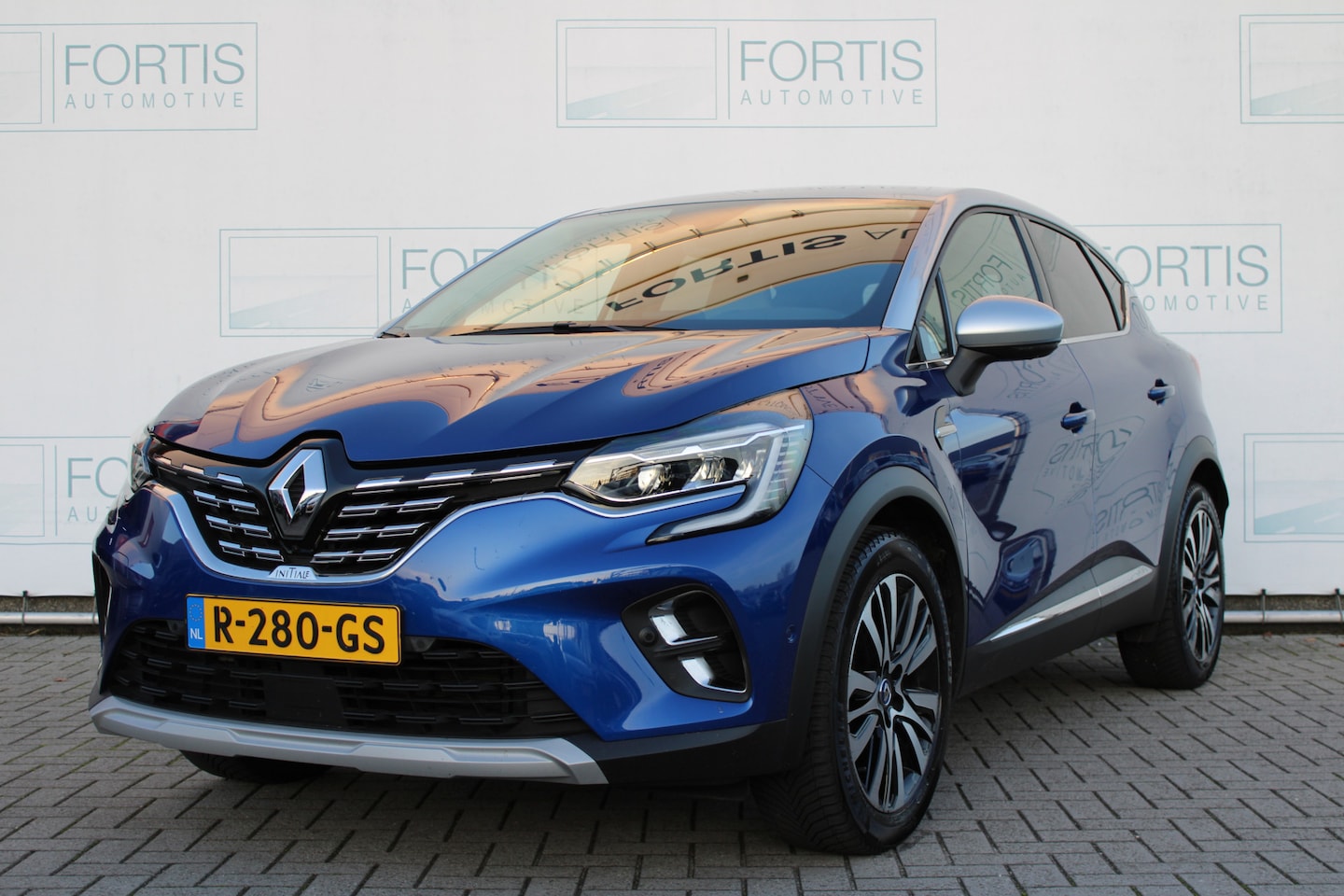 Renault Captur - 1.3 TCe 140 EDC Initiale Paris NL AUTO | LUXE LEDER | 360 CAMERA | SFEERVERLICHTING - AutoWereld.nl