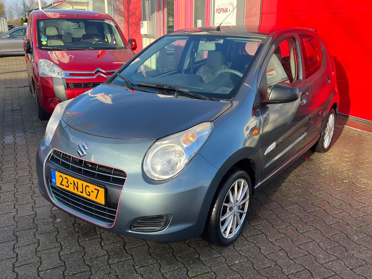 Suzuki Alto - 1.0 68pk Comfort Plus Airco / LM 15" velgen / Super kilometerstand / Parkeersensoren / Ach - AutoWereld.nl