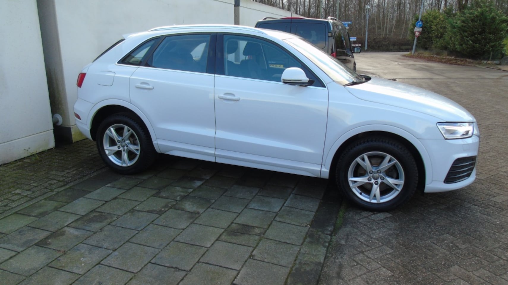 Audi Q3 - 1.4 TFSI CoD SpAd Sp - AutoWereld.nl