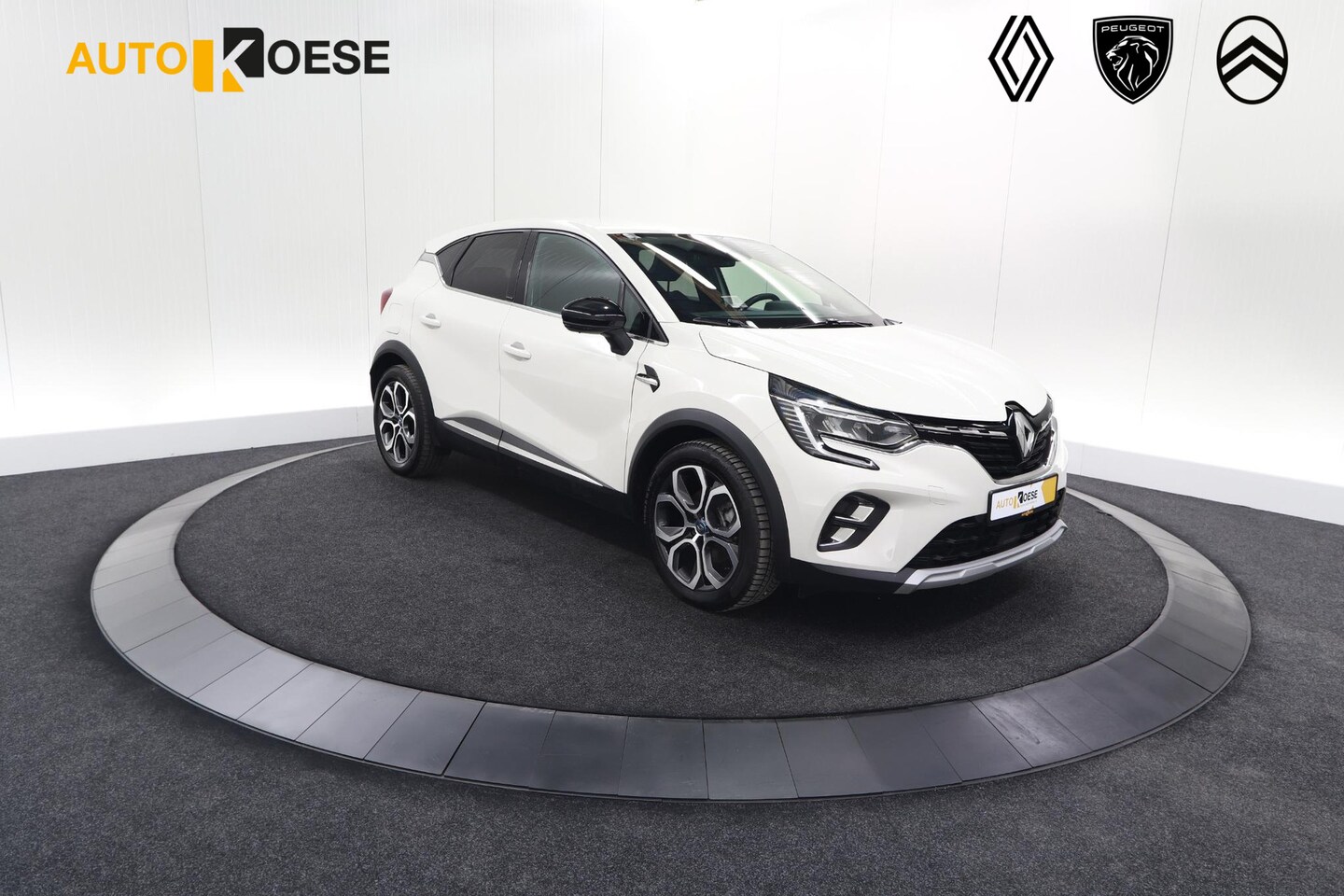 Renault Captur - 1.6 E-Tech Plug-in Hybrid 160 Intens | Trekhaak | Parkeersensoren | Navigatie | 18 Inch Ve - AutoWereld.nl