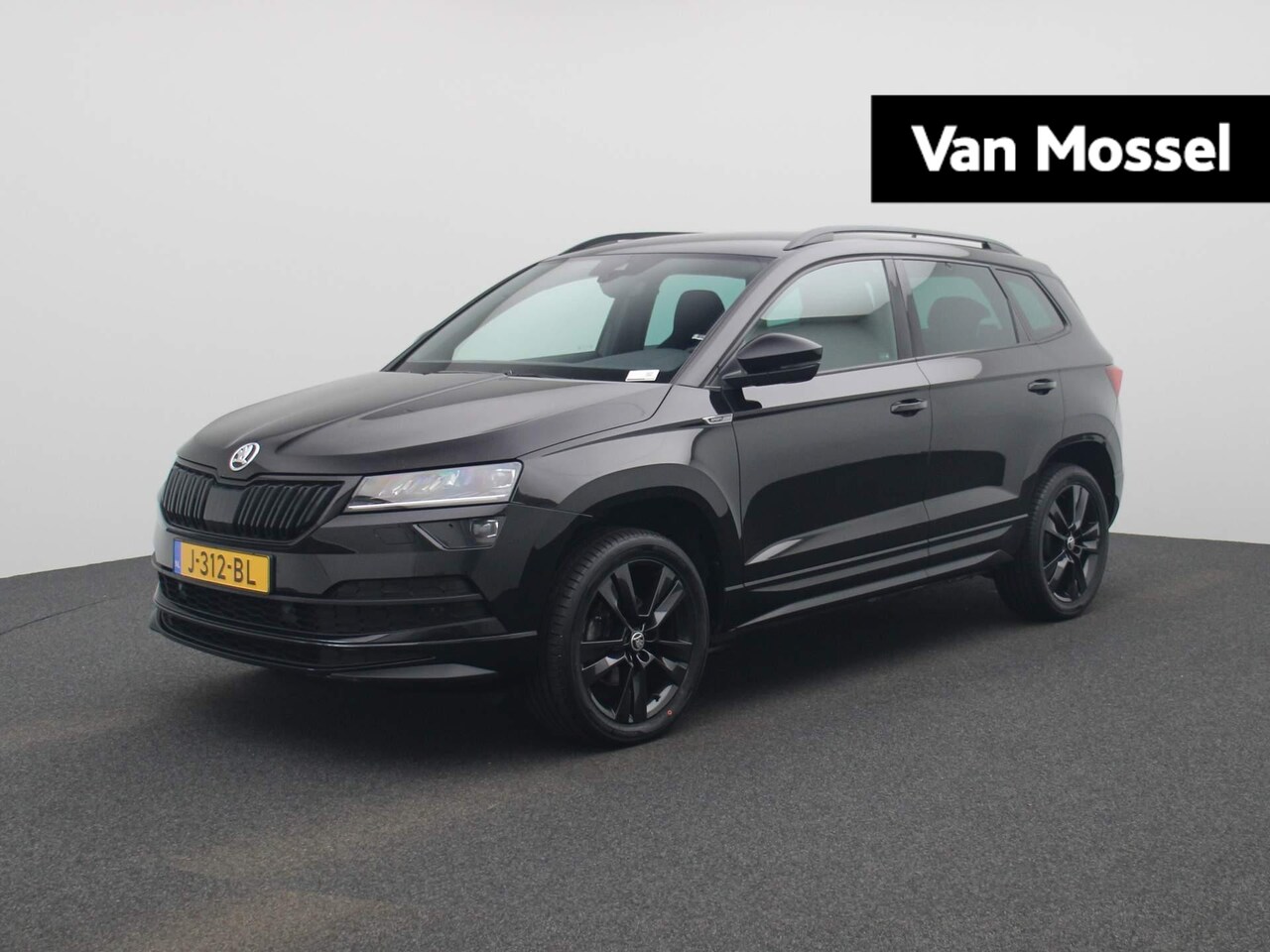 Skoda Karoq - 1.5 TSI ACT Sportline Business | NAVIGATIE | | ACHTERUITRIJCAMERA | LED | ELEKTRISCHE ACHT - AutoWereld.nl