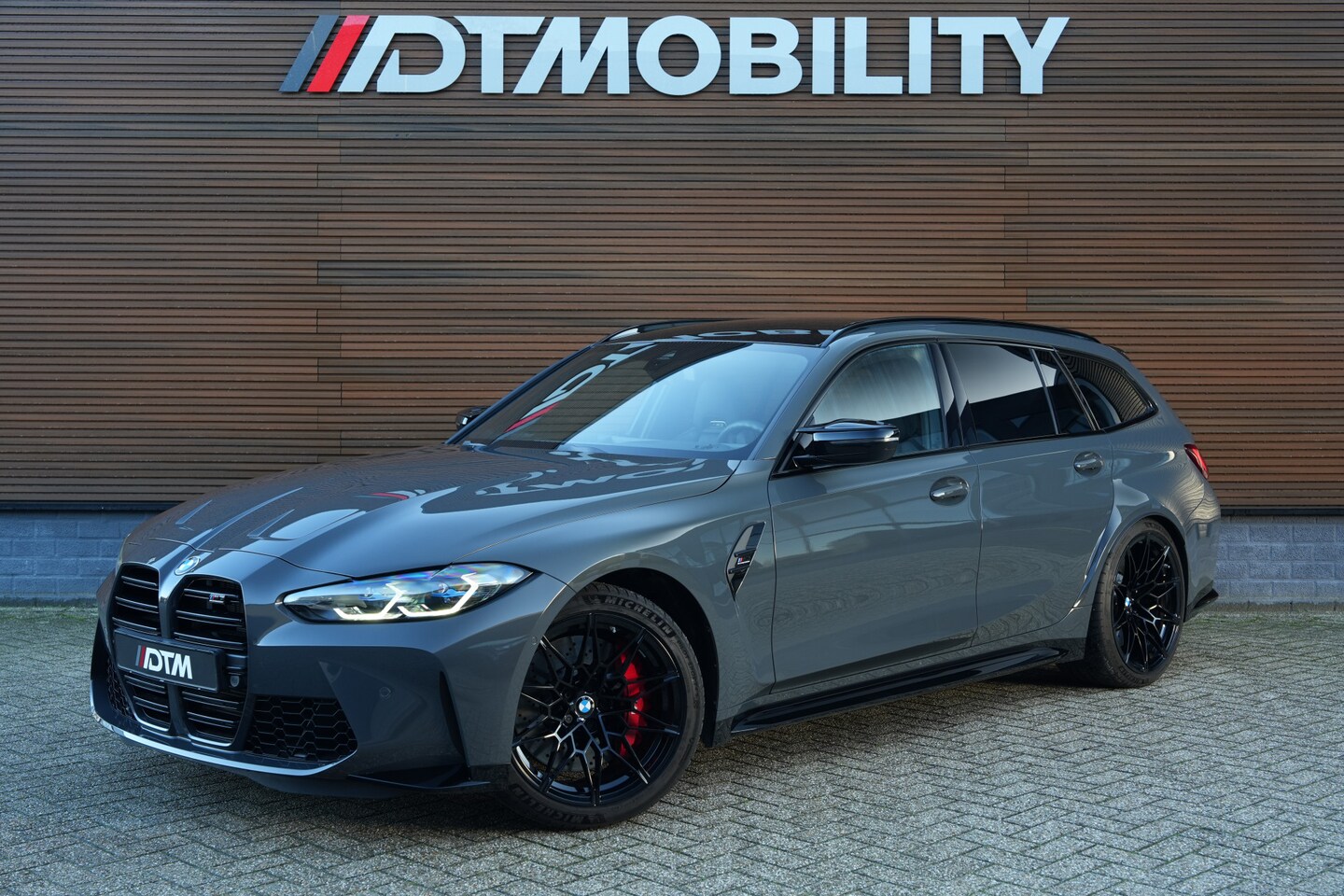 BMW 3-serie Touring - M3 xDrive Competition | Carbon | Dravitgrau | - AutoWereld.nl