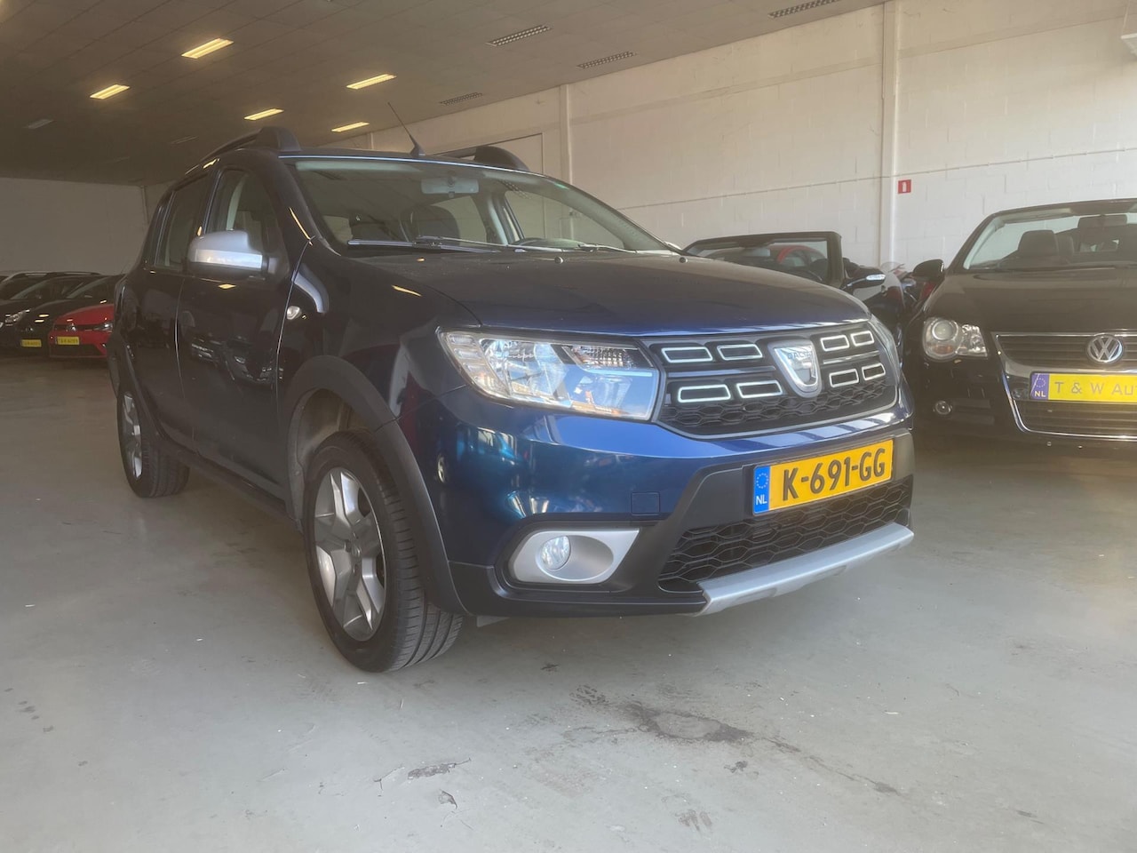 Dacia Sandero - 0.9 TCe Tech Road navi camera cruise - AutoWereld.nl