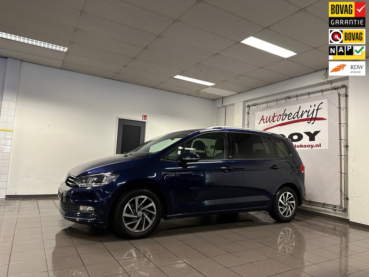 Volkswagen Touran - 1.4 TSI Highline * Automaat / 7 Persoons / Navigatie / Trekhaak / Stoelverwarming * - AutoWereld.nl