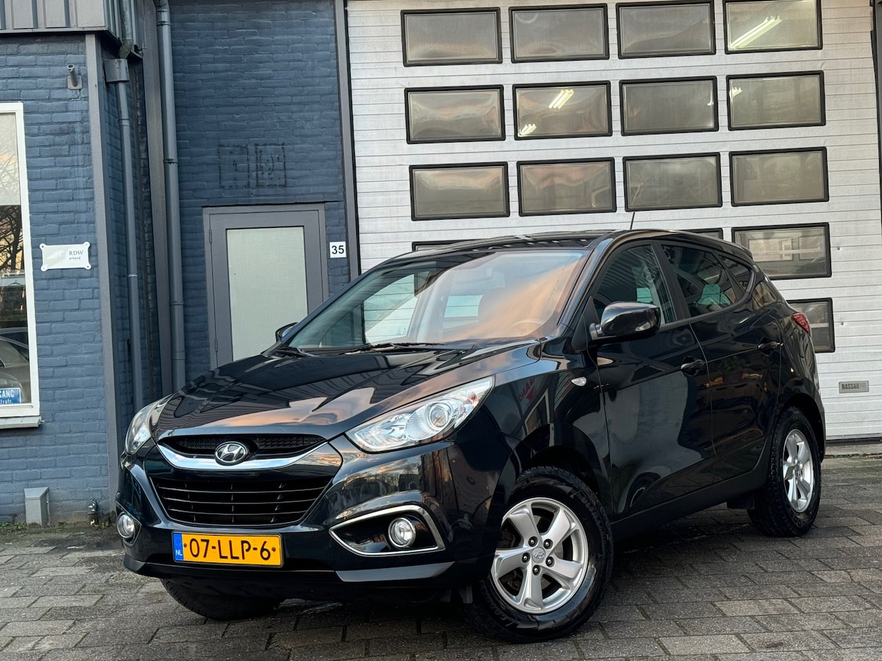 Hyundai ix35 - 2.0i Dynamic | Clima | Cruise | LMV | N.A.P - AutoWereld.nl