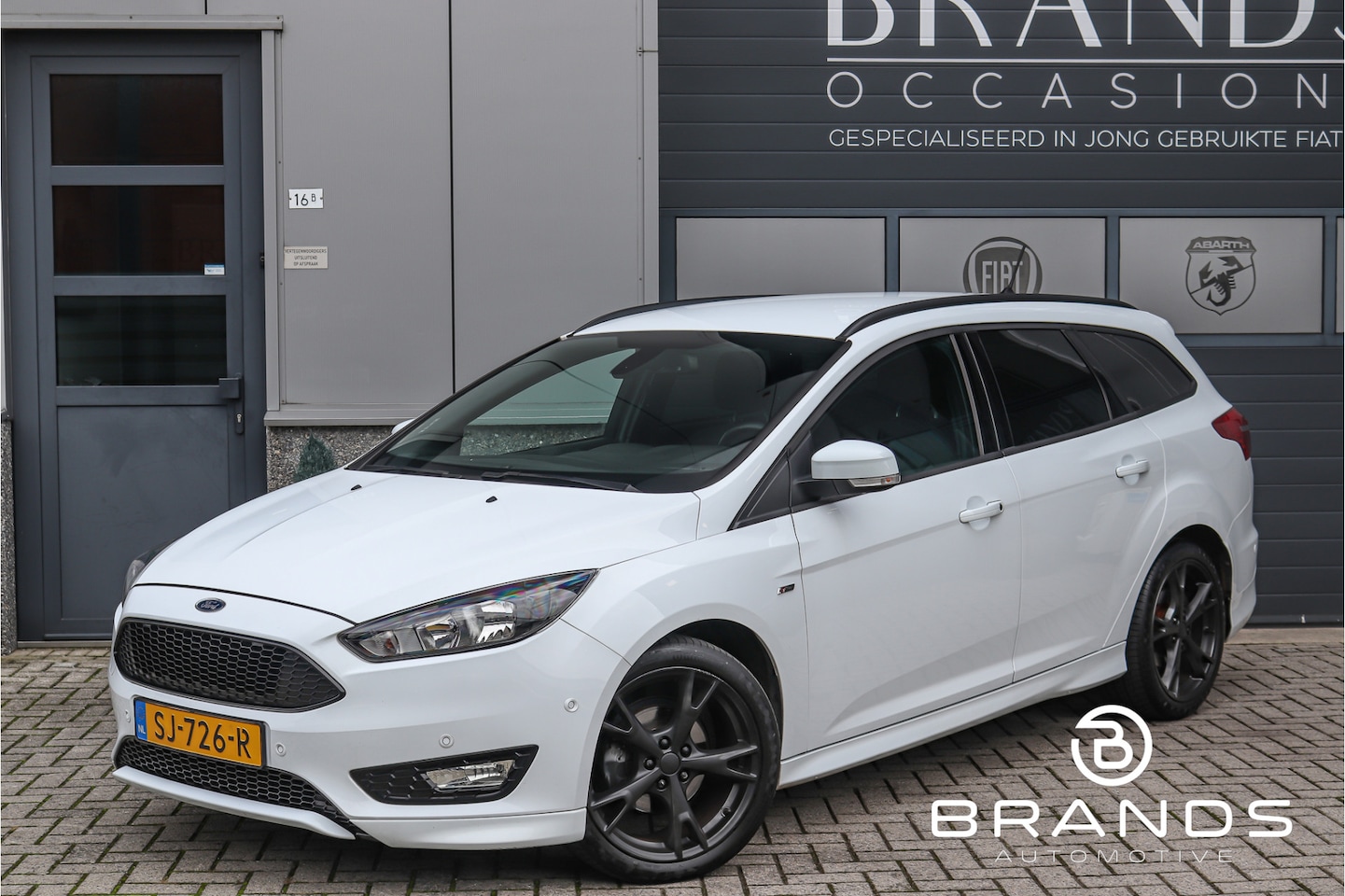 Ford Focus Wagon - 1.0 ST-Line Navi Clima Cruise control PDC - AutoWereld.nl