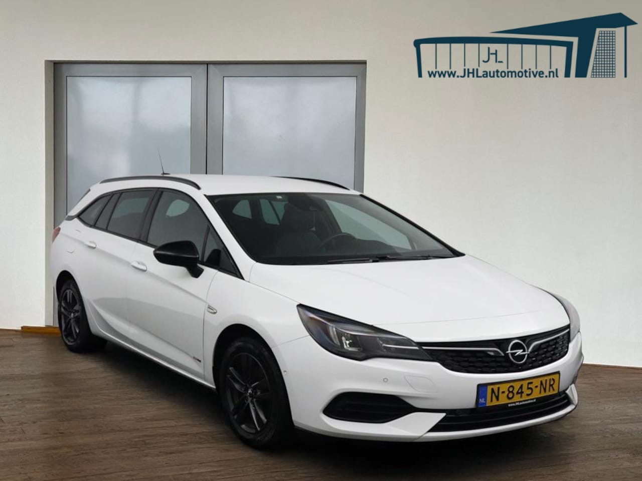 Opel Astra Sports Tourer - 1.2 Design & Tech*ECC*NAVI*CAMERA*HAAK* - AutoWereld.nl