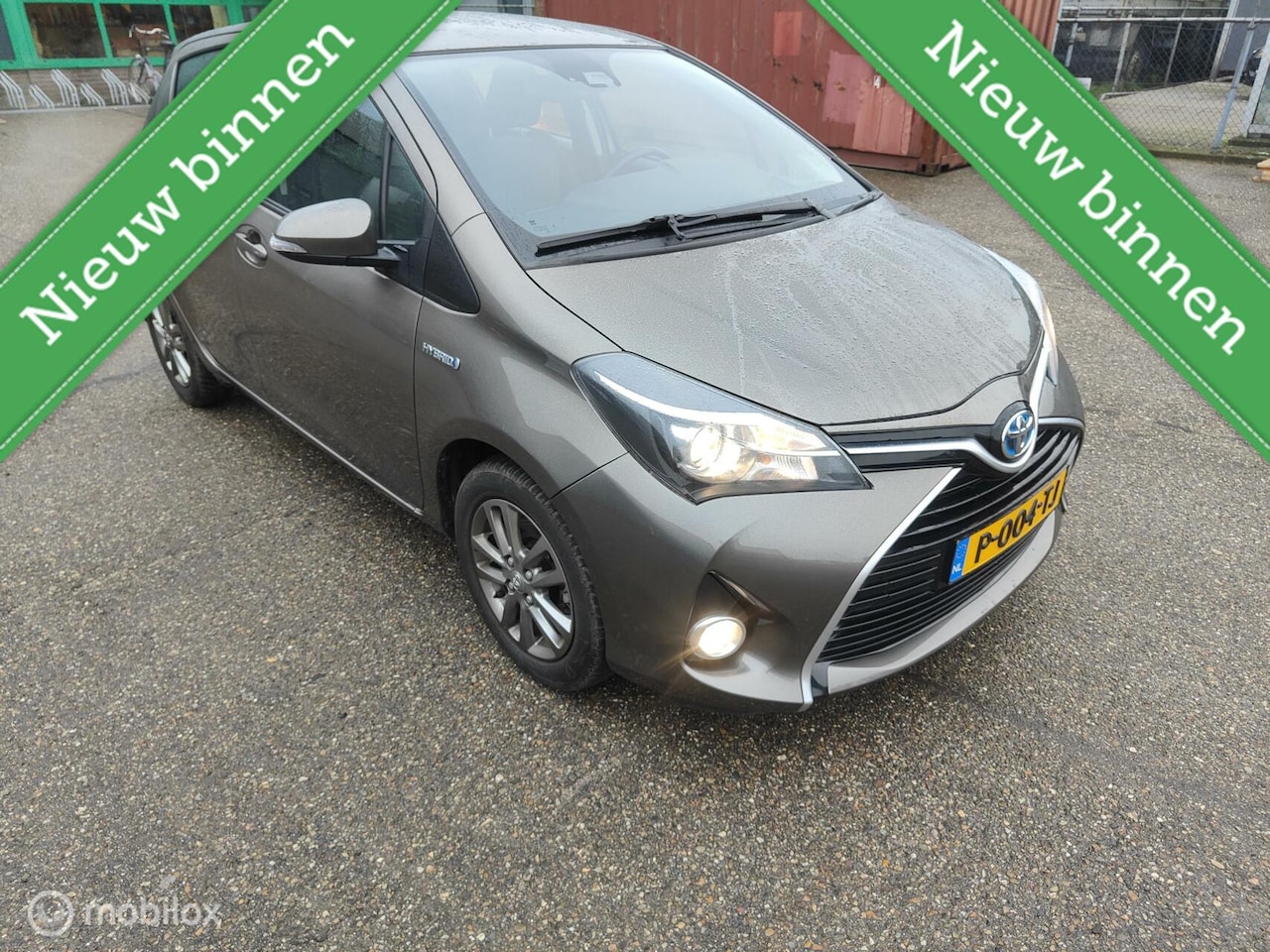 Toyota Yaris - 1.5 Hybrid Trend Bi-Tone 2017, 51000 KM, AUTOM. - AutoWereld.nl