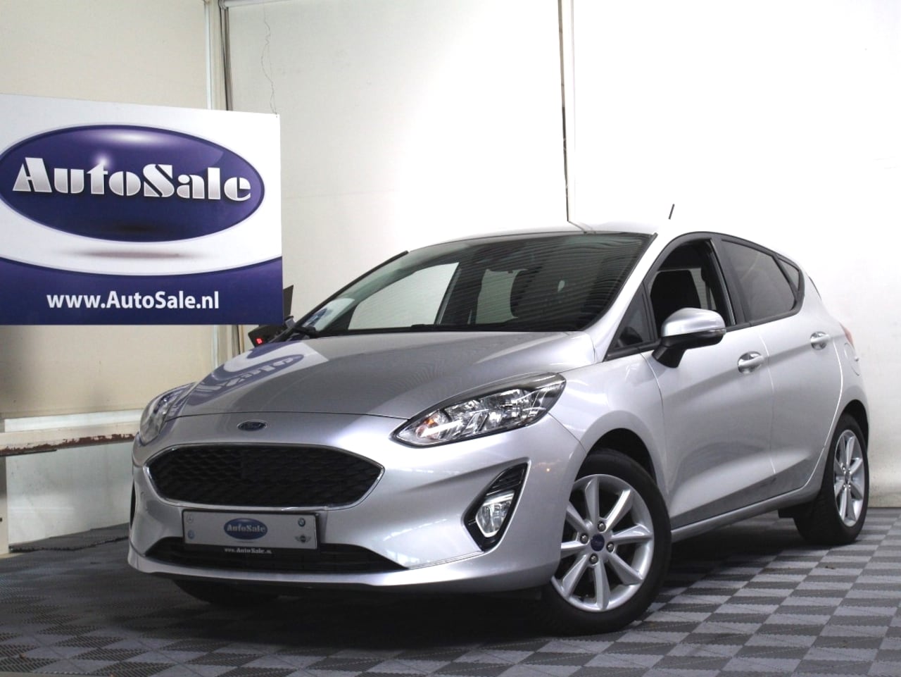 Ford Fiesta - 1.1 Titanium 2eEIG! CARPLAY NAV STOELVW CRUISE CLIMA '19 - AutoWereld.nl