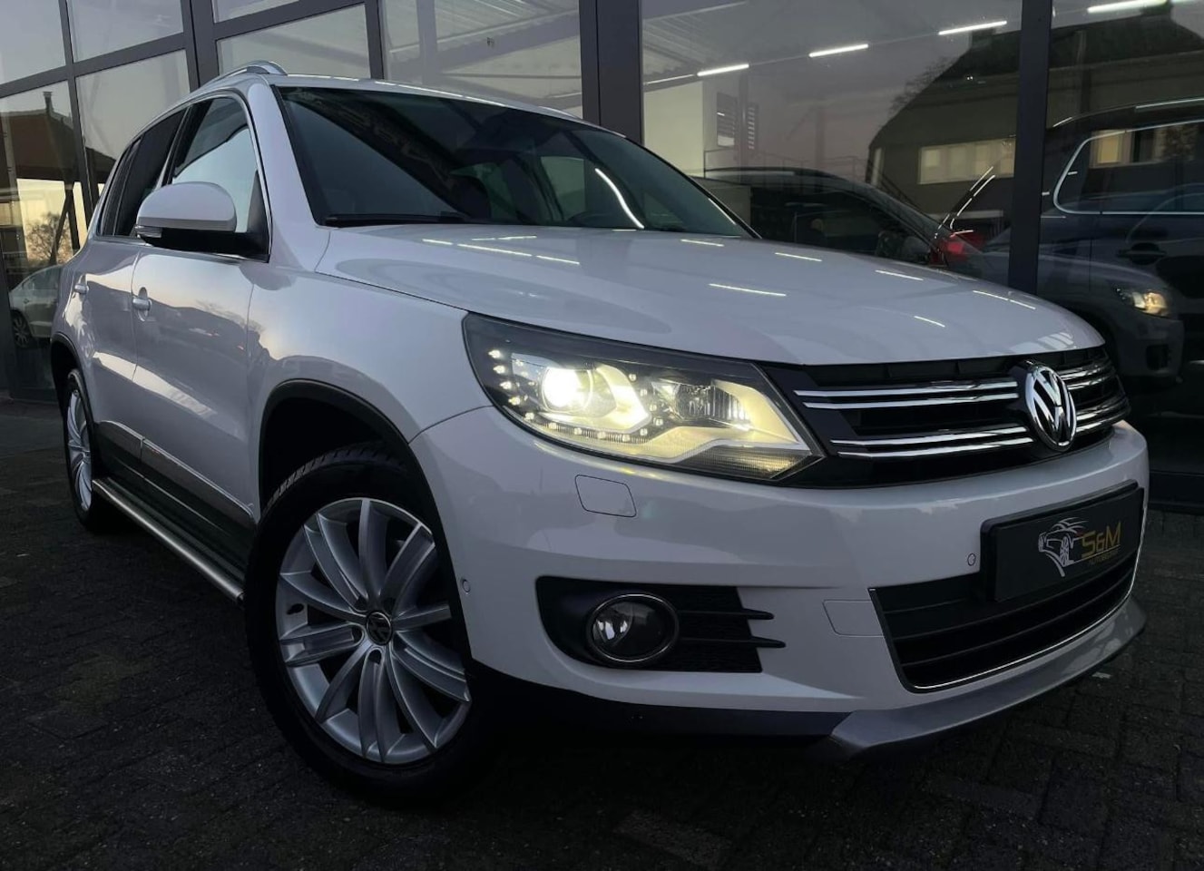 Volkswagen Tiguan - 2.0 TSI Sport&Style 4Motion - AutoWereld.nl