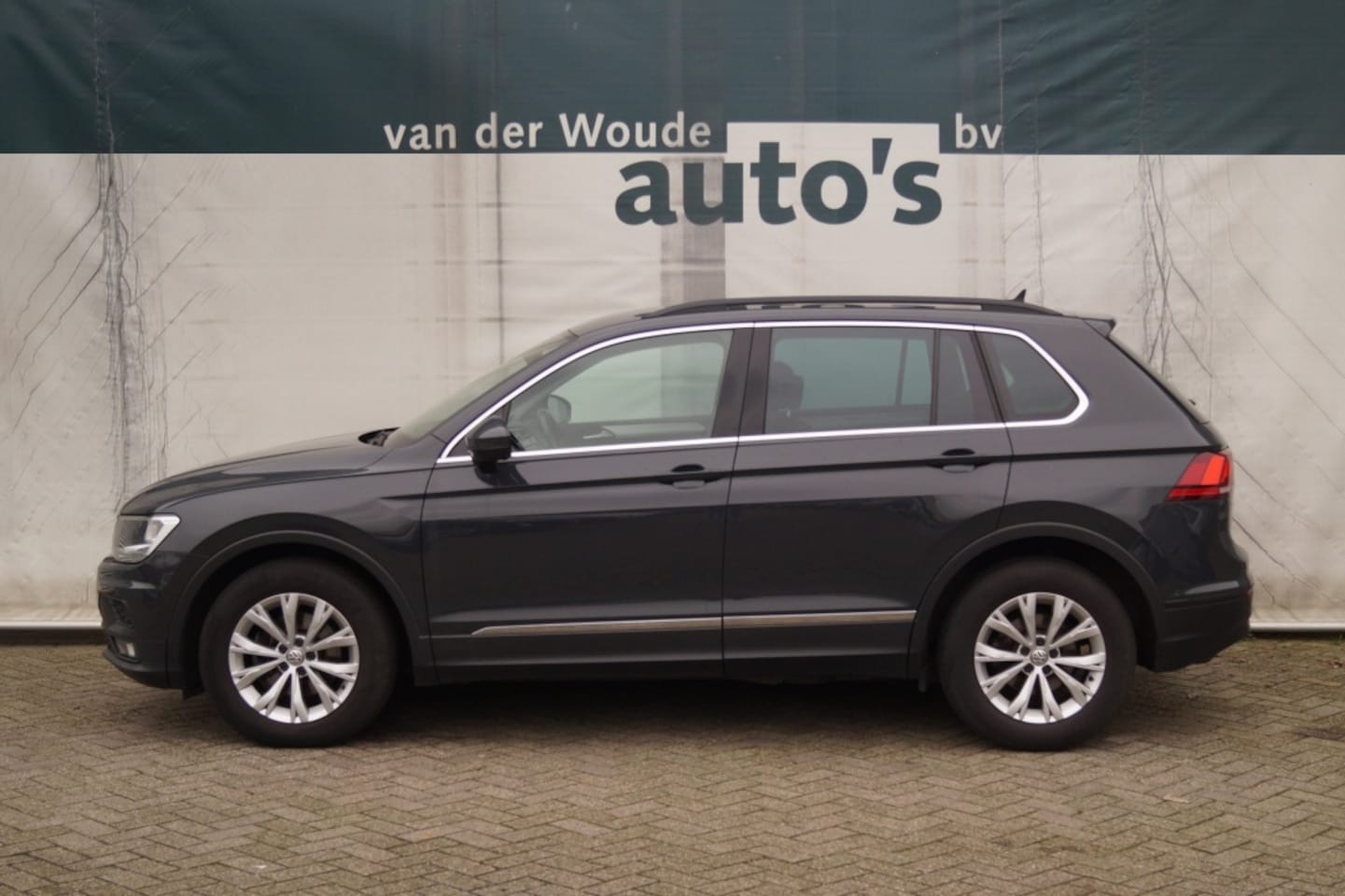 Volkswagen Tiguan - 1.5 TSI 150pk DSG Comfortline -NAVI-ECC-TREKHAAK- - AutoWereld.nl