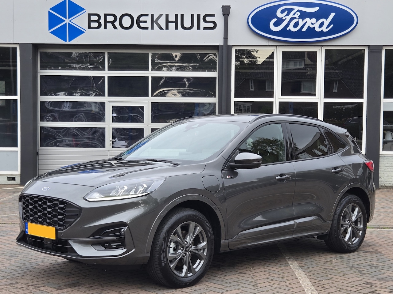 Ford Kuga - 2.5 PHEV ST-LINE | ORIGINEEL NL! | CAMERA | STANDVERWARMING | DEALER OH! | CRUISE | CLIMAT - AutoWereld.nl