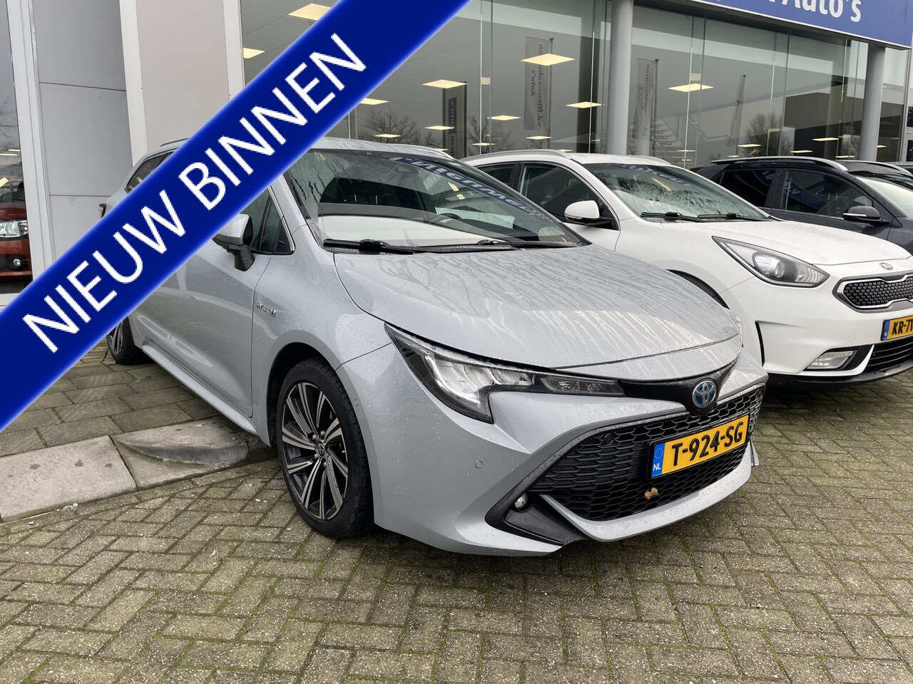 Toyota Corolla Touring Sports - 1.8 Hybrid Dynamic | Stoelverwarming | Adaptive Cruise | Keyless | - AutoWereld.nl