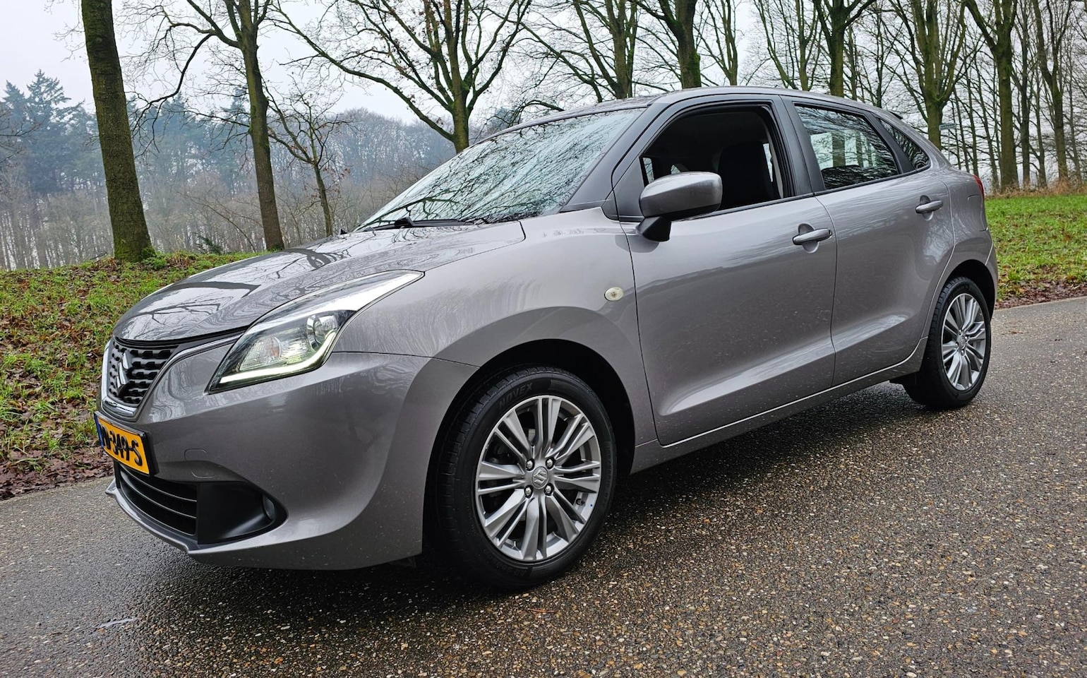 Suzuki Baleno - 1.2 Exclusive 58.483 KM ! NL Auto ! Xenon Navi - AutoWereld.nl