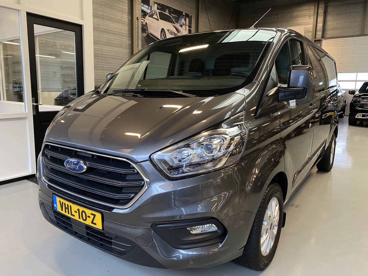 Ford Transit Custom - 300 2.0 TDCI L2H2 Limited Navi, Camera, Trekhaak, 170PK - AutoWereld.nl