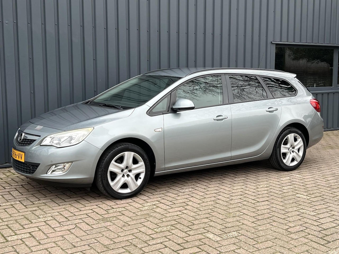 Opel Astra Sports Tourer - 1.4 Turbo Cosmo APK!/CLIMA!/ONDERHOUDEN!/ - AutoWereld.nl