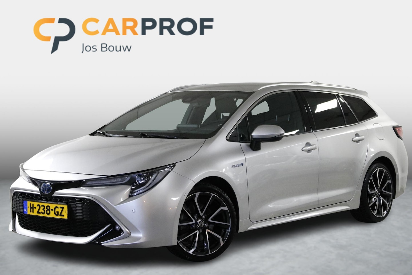 Toyota Corolla Touring Sports - 2.0 Hybrid Executive Clima | Navi | Camera | Alcantara | Leder | Volle auto! - AutoWereld.nl