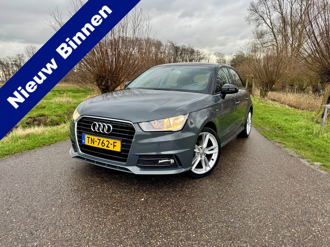 Audi A1 Sportback - 1.0 TFSI Adrenalin / Navigatie / Airco / Cruise Control / LM Velgen / PDC - AutoWereld.nl