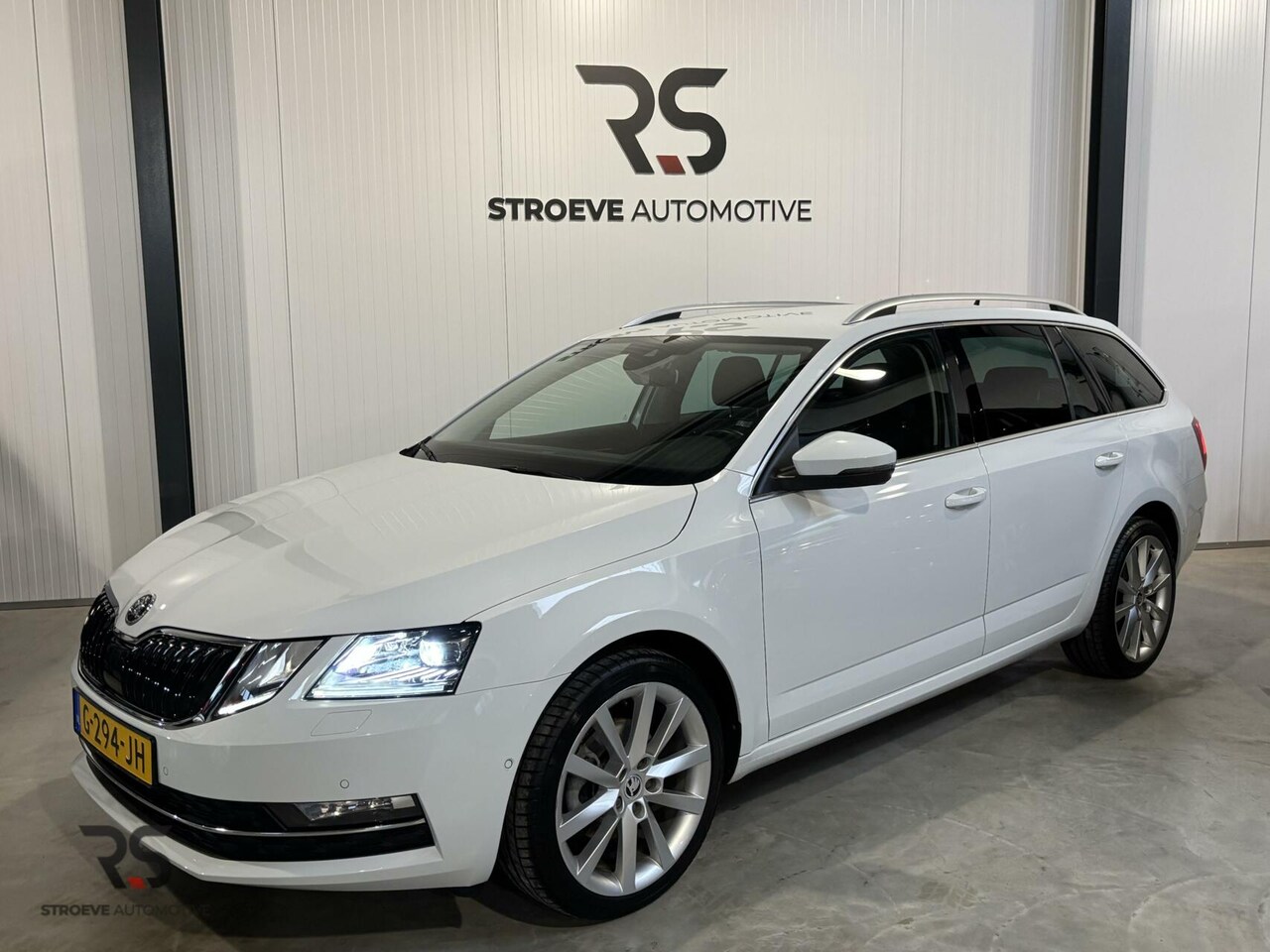 Skoda Octavia Combi - Business Edition Plus | Navi | LED | Camera | Leder | Cruise | PDC | DAB | Canton | Virtua - AutoWereld.nl