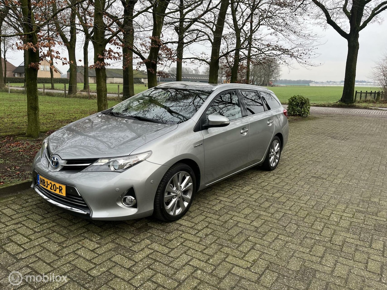 Toyota Auris Touring Sports - 1.8 Hybrid All in rijklaar - AutoWereld.nl