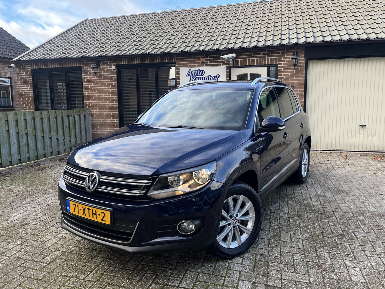 Volkswagen Tiguan - 2.0 TDI Sport&Style 4Motion Automaat - AutoWereld.nl