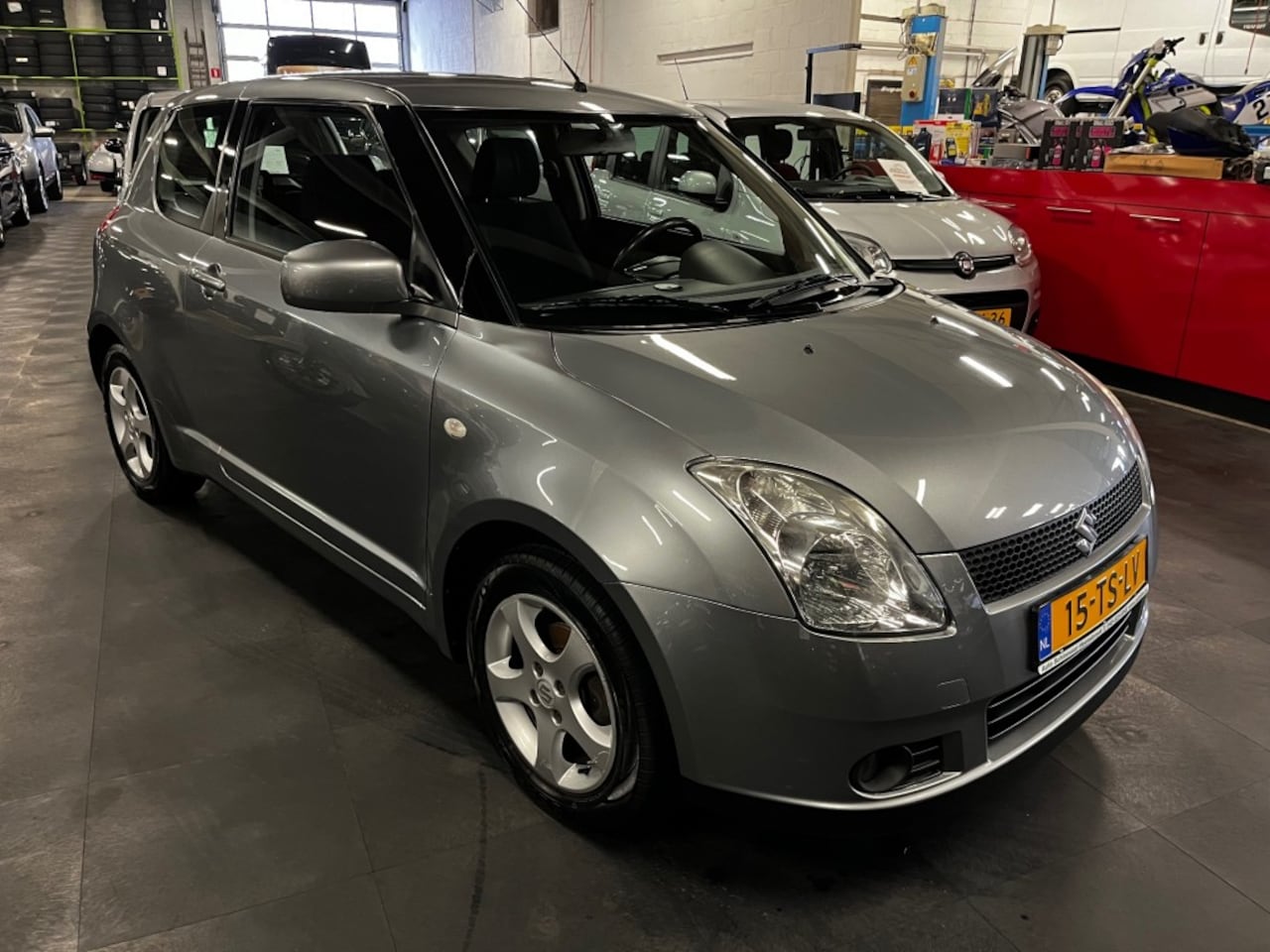 Suzuki Swift - 1.3 EXCLUSIVE AUTOMAAT *AIRCO* - AutoWereld.nl