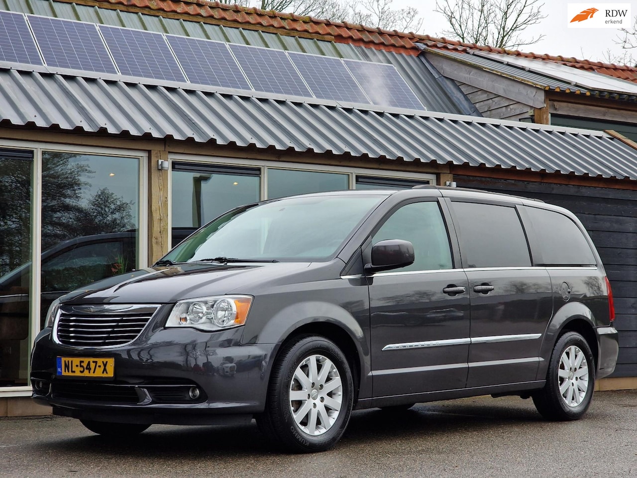 Chrysler Town and Country - 3.6 V6 (Leder / Climate / Cruise / Camera / Navigatie / 7 Persoons) - AutoWereld.nl