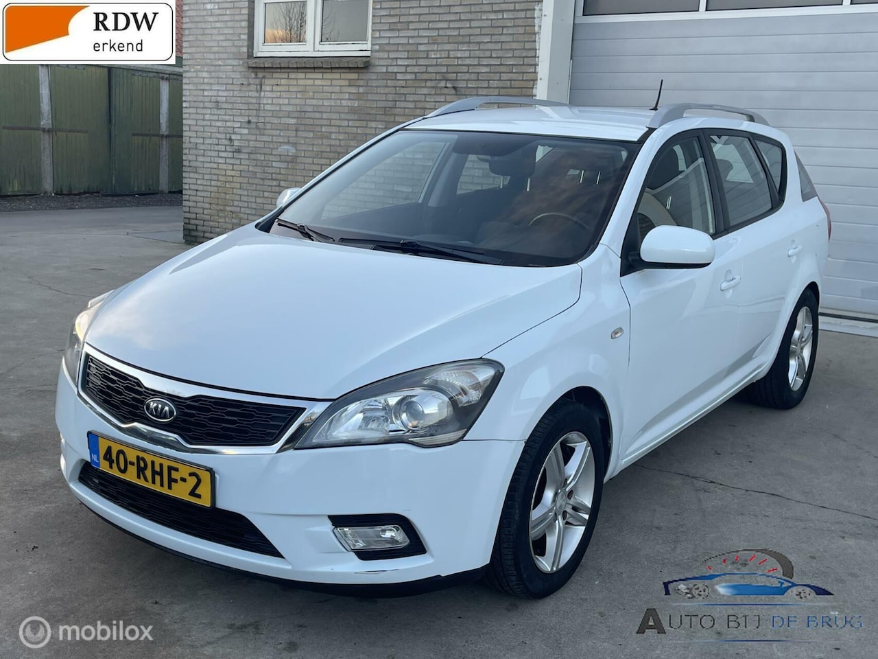 Kia Cee'd Sporty Wagon - 1.4 CVVT Navigator Plus Pack 1.4 CVVT Navigator Plus Pack - AutoWereld.nl