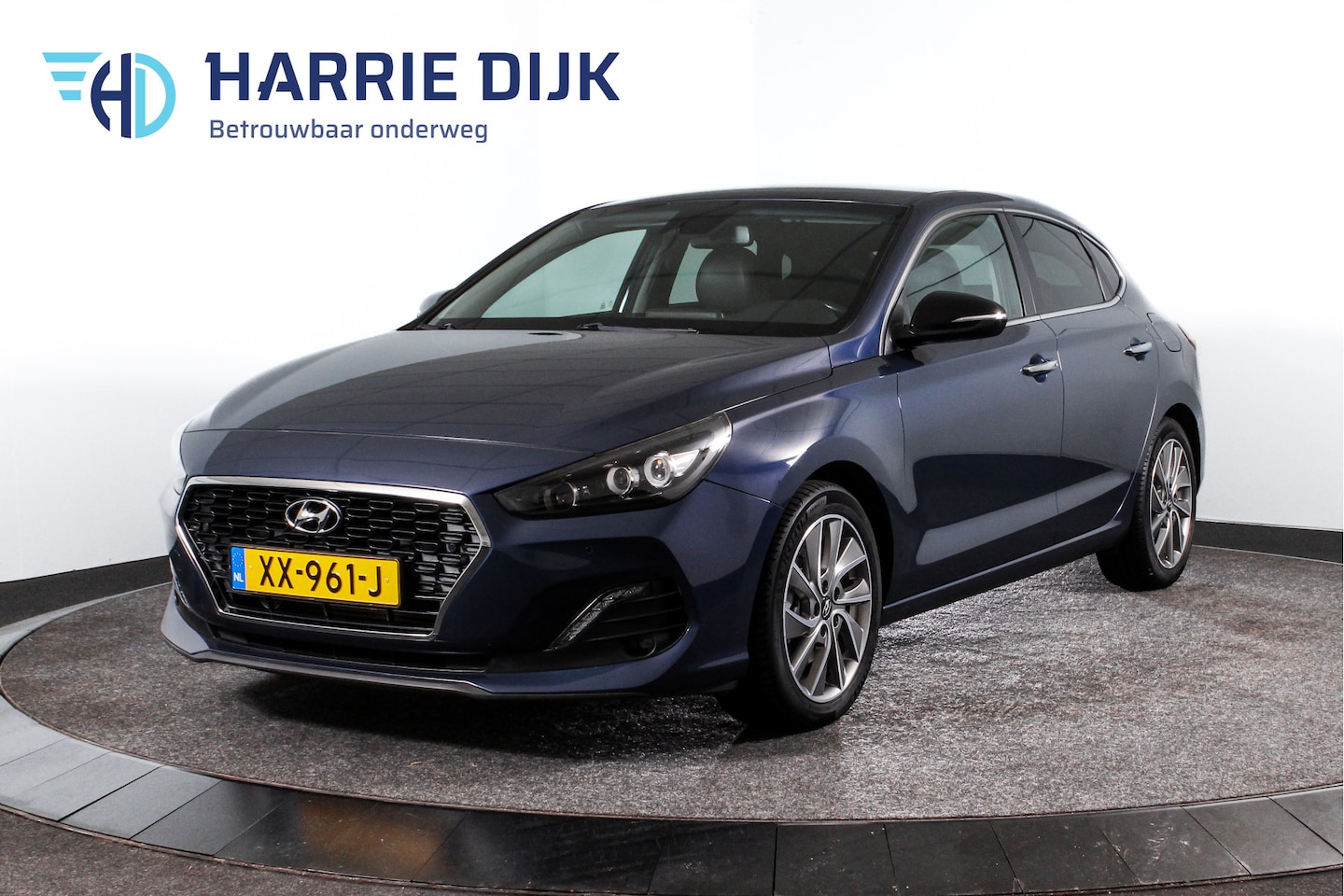 Hyundai i30 Fastback - 1.0 T-GDI 120 PK Premium | Cruise | Camera | PDC | NAV + App. Connect | ECC | Afn. Trekhaa - AutoWereld.nl