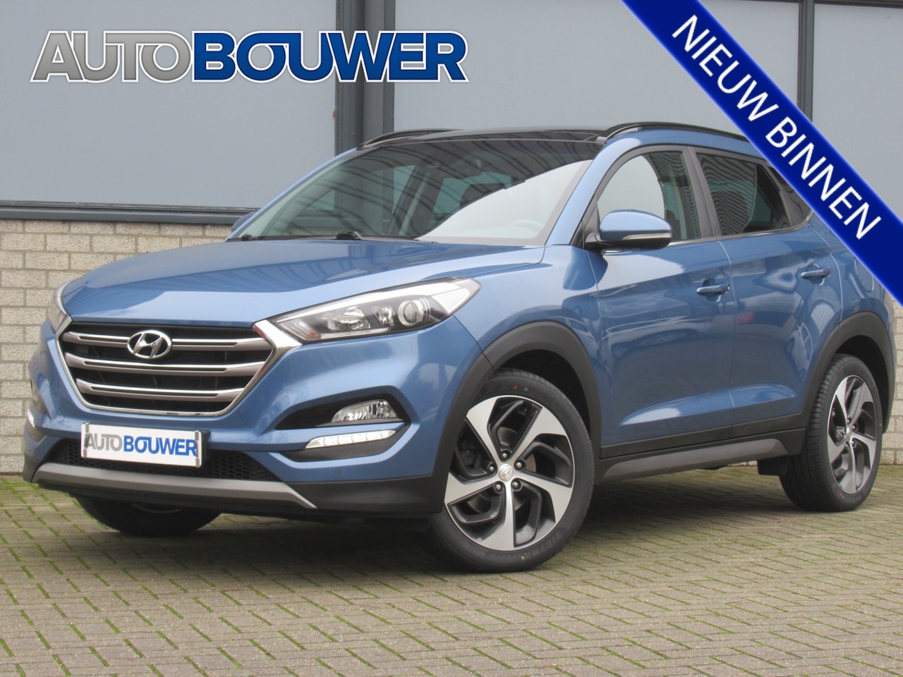 Hyundai Tucson - 1.6 T-GDI 177 PK 4WD Automaat 2e eigen | leder | 19 "inch | panorama dak | navi | camera - AutoWereld.nl