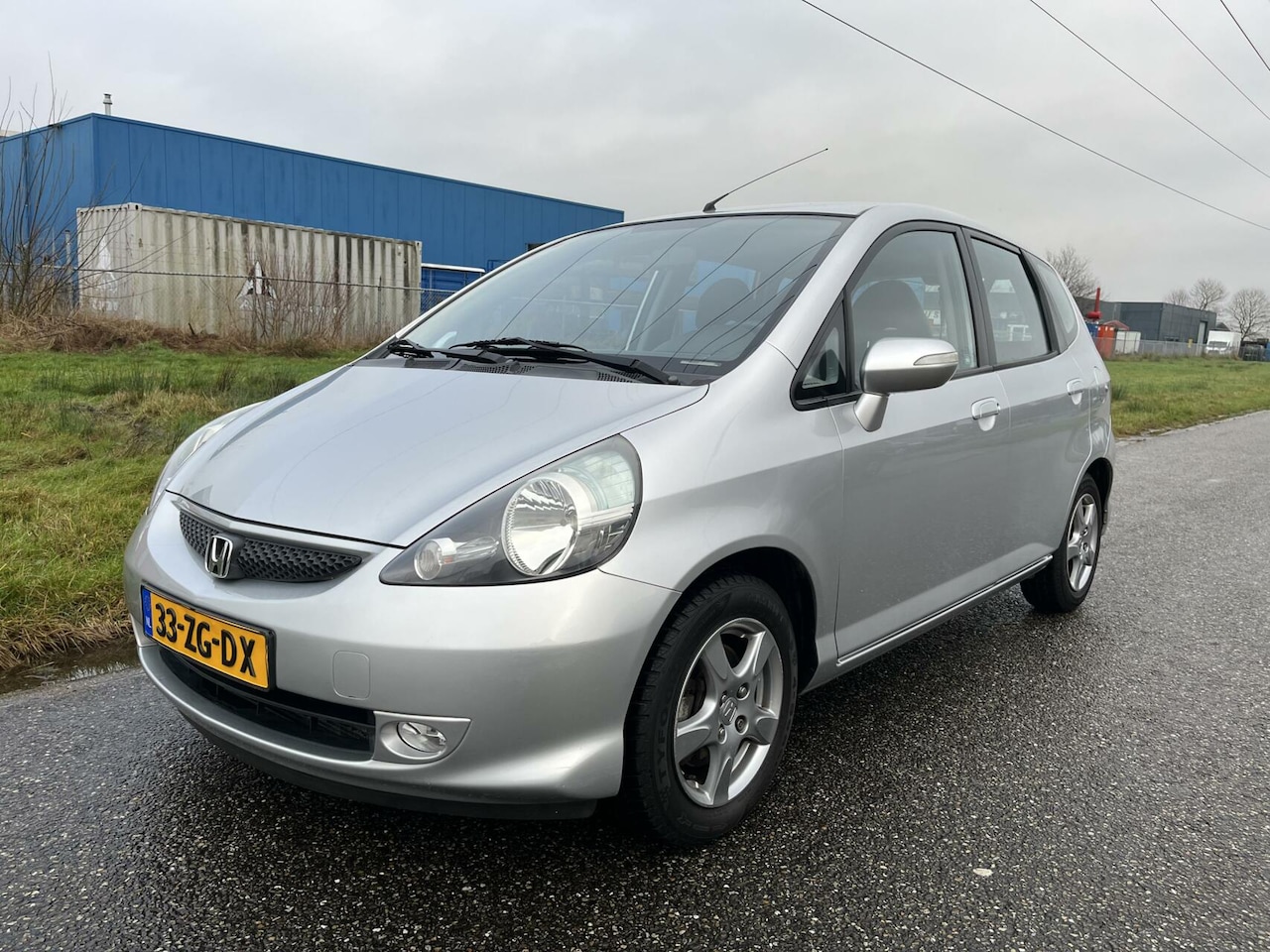 Honda Jazz - 1.4 Style Automaat Clima/PDC - AutoWereld.nl