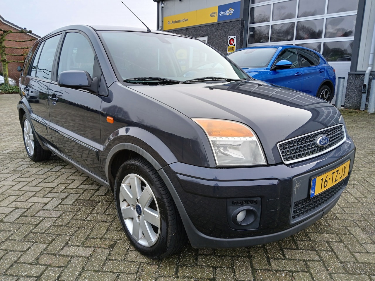 Ford Fusion - 1.4-16V Futura - Airco - Trekhaak - AutoWereld.nl