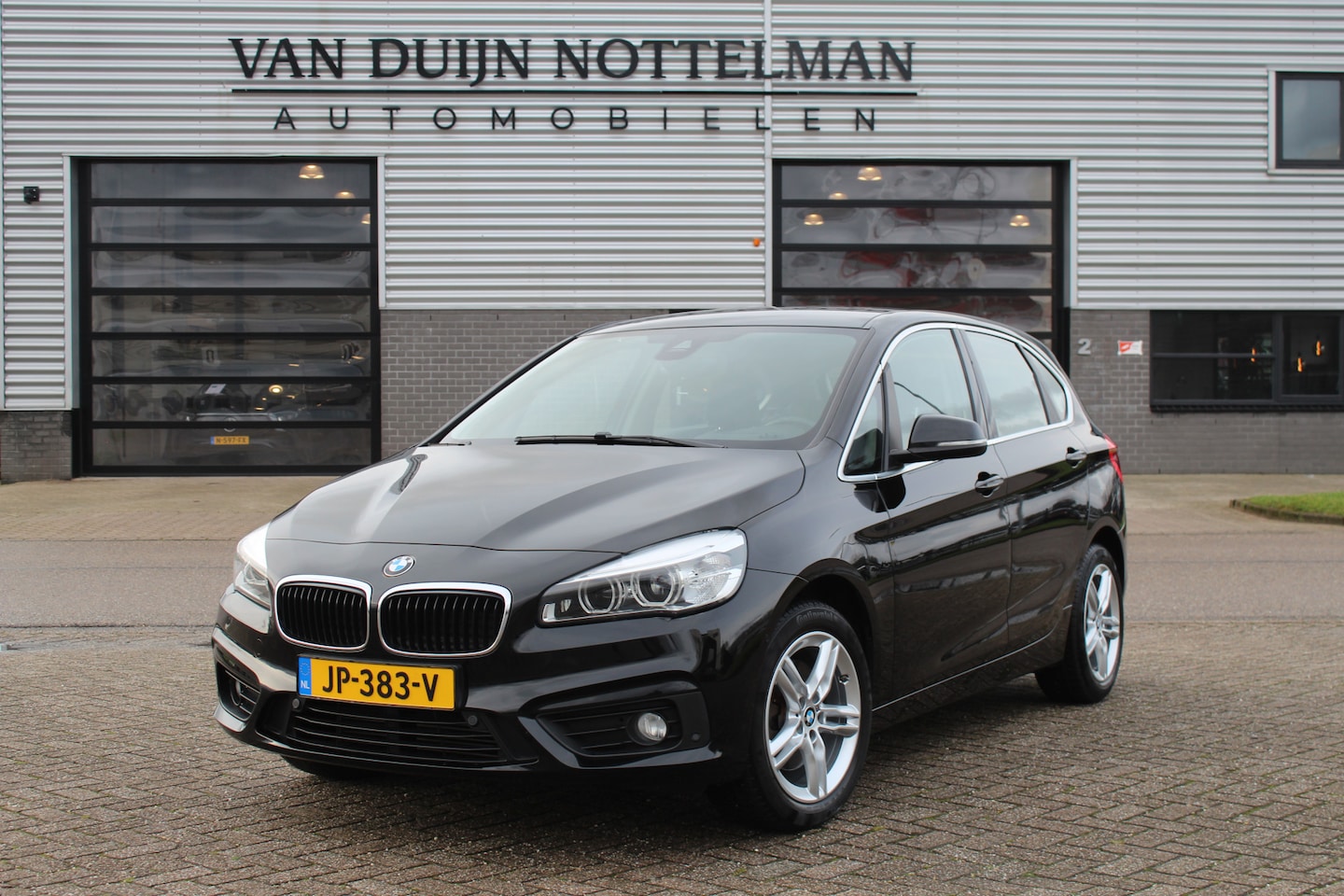 BMW 2-serie Active Tourer - 218i Centennial High Executive / Navigatie / Leer / HUD / N.A.P. - AutoWereld.nl