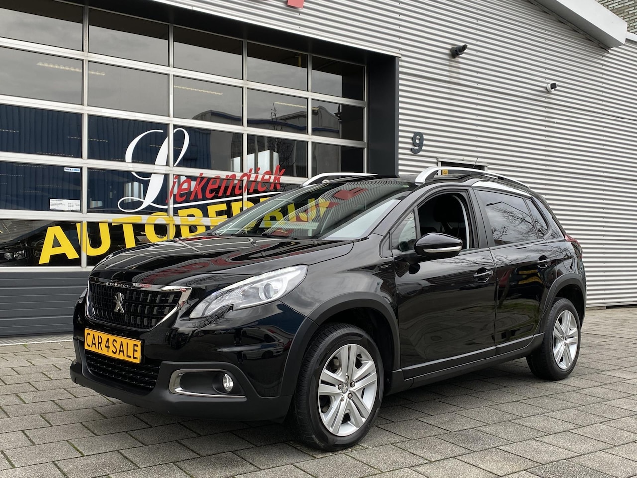 Peugeot 2008 - 1.2 PureTech Signature - Navigatie / Apple CarPlay I Airco I PDC / Achteruitrij camera I S - AutoWereld.nl