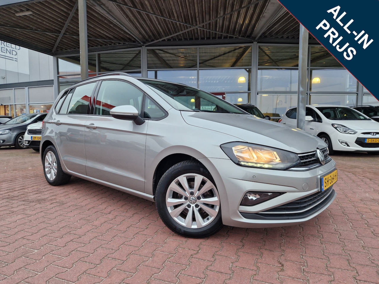 Volkswagen Golf Sportsvan - 1.0 TSI Comfortline 12MND BOVAG GARANTIE | NAVI | PARK PILOT | ADAPT. CC | APP CONNECT - AutoWereld.nl