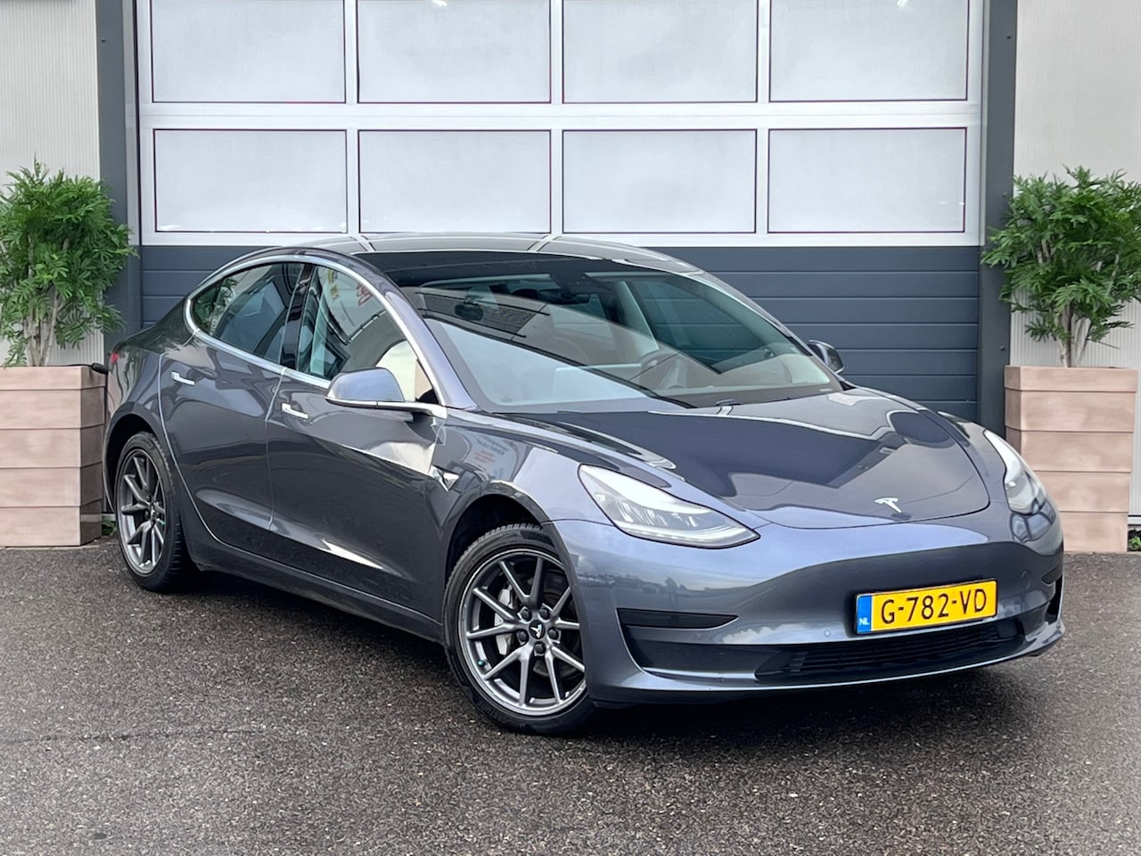 Tesla Model 3 - Standard RWD Plus 60 kWh / TREKHAAK / CAMERA / AIRCO / INCL BTW / LEER / PANO / NAP / - AutoWereld.nl