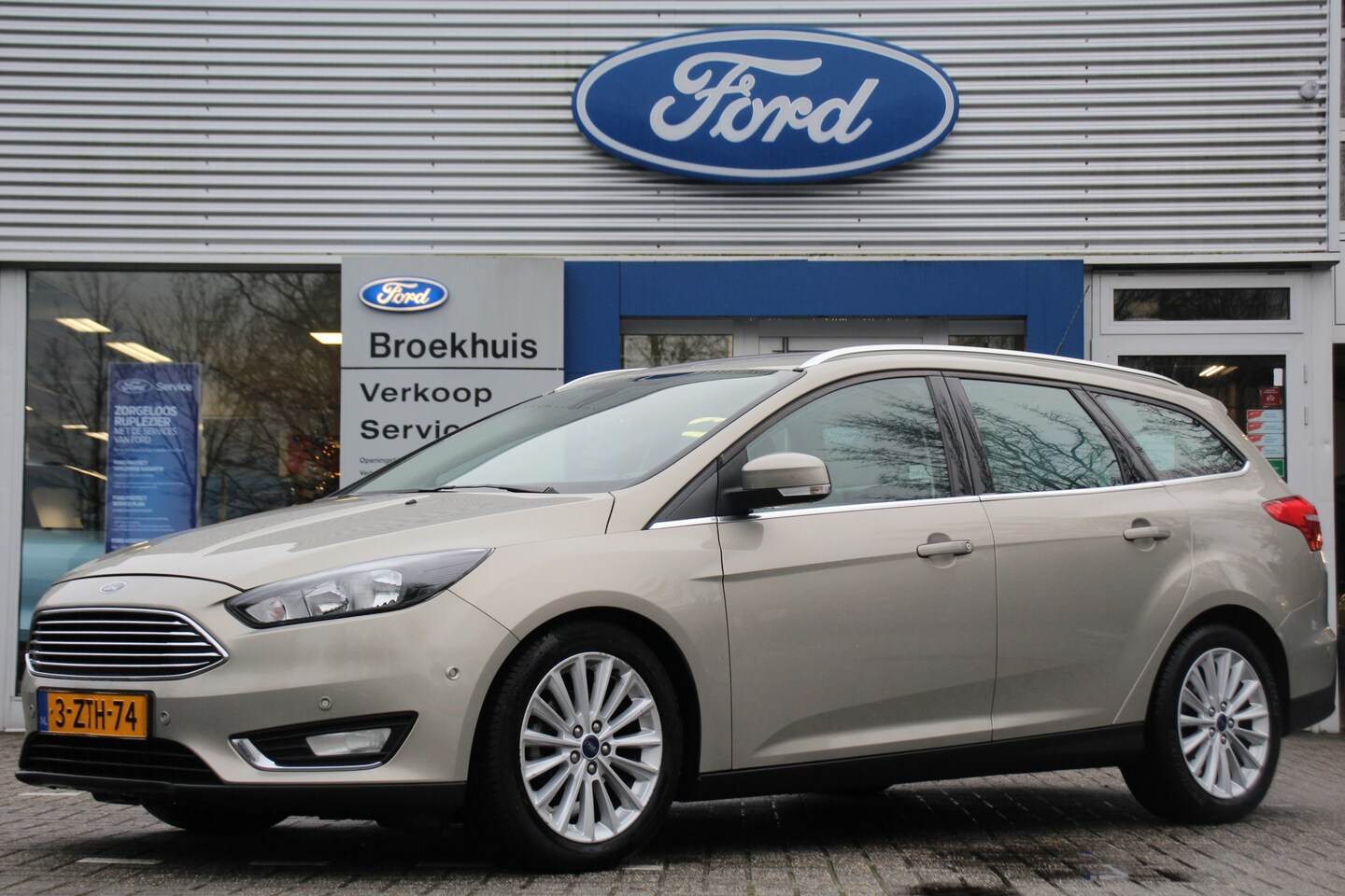 Ford Focus Wagon - 1.0 TITANIUM | NL-AUTO! | DEALER OH! | NAVI | CLIMA | CRUISE | PARK SENS V+A | 17' LM. VEL - AutoWereld.nl