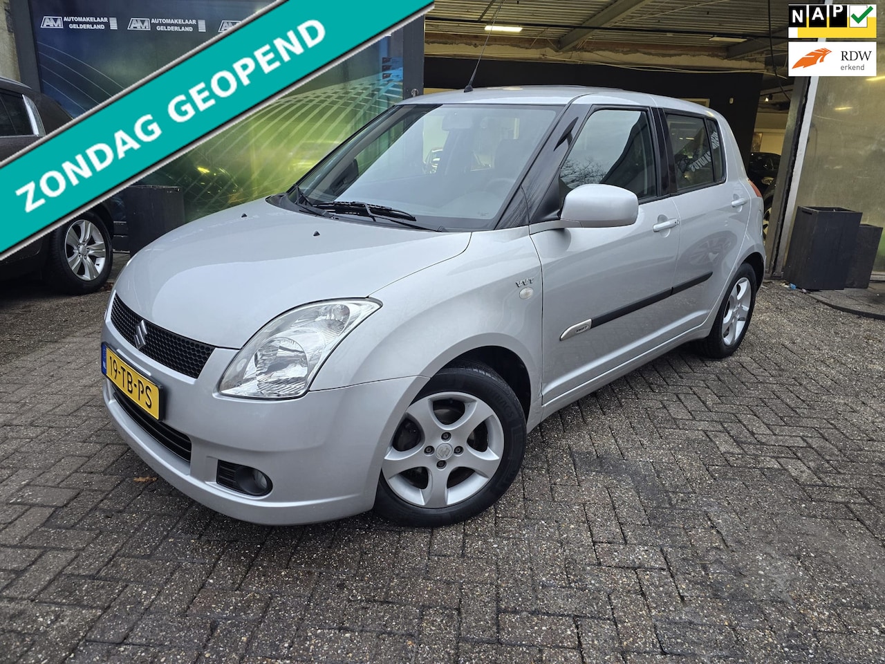 Suzuki Swift - 1.5 Exclusive | AUTOMAAT | 12MND GARANTIE | NW APK | AIRCO | LMV | - AutoWereld.nl