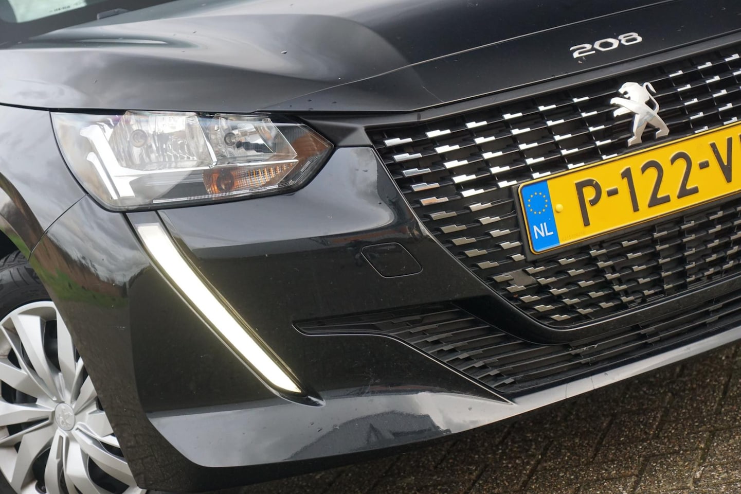 Peugeot 208 - 1.2 PureTech Active Pack - Noir Perla Nera - Nav/Carplay - Chique - AutoWereld.nl