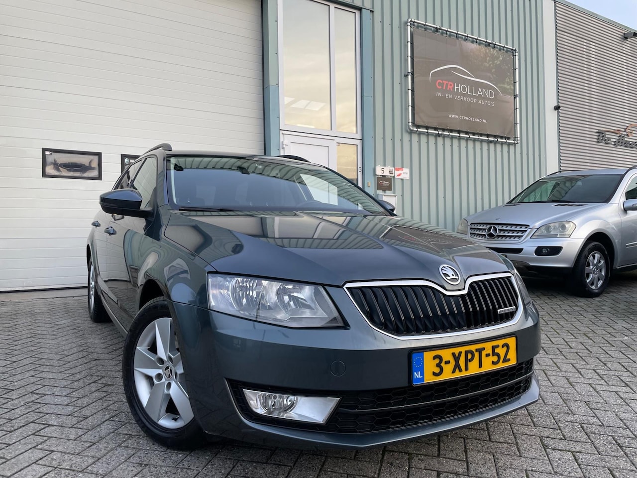 Skoda Octavia Combi - 1.6 TDI Businessline (10-2014) Climate control|lmv|nette auto - AutoWereld.nl