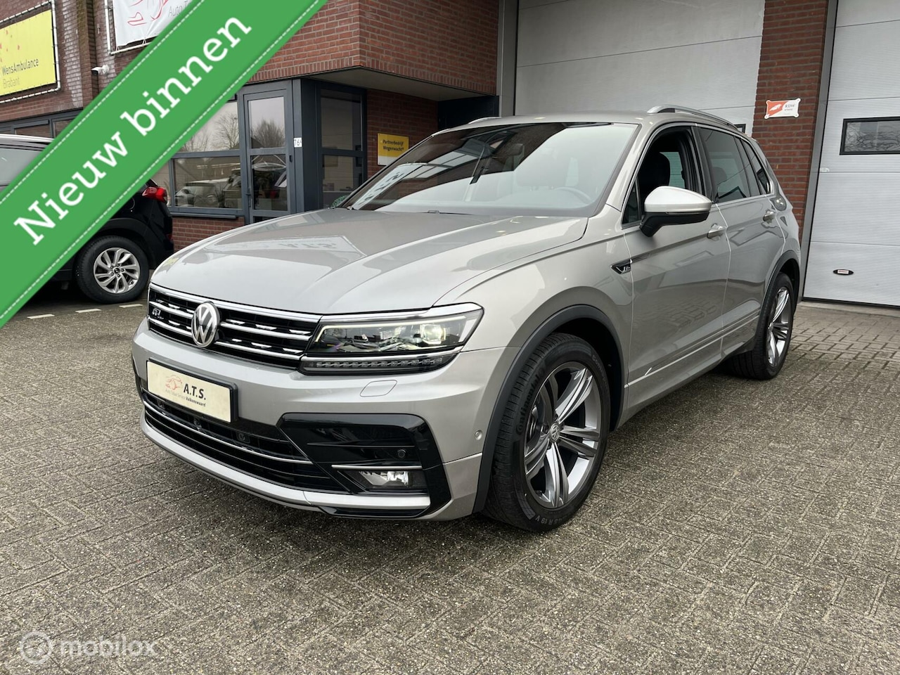 Volkswagen Tiguan - 1.4 TSI ACT R-LINE*TREKHAAK*CAMERA*ACC*LED* - AutoWereld.nl