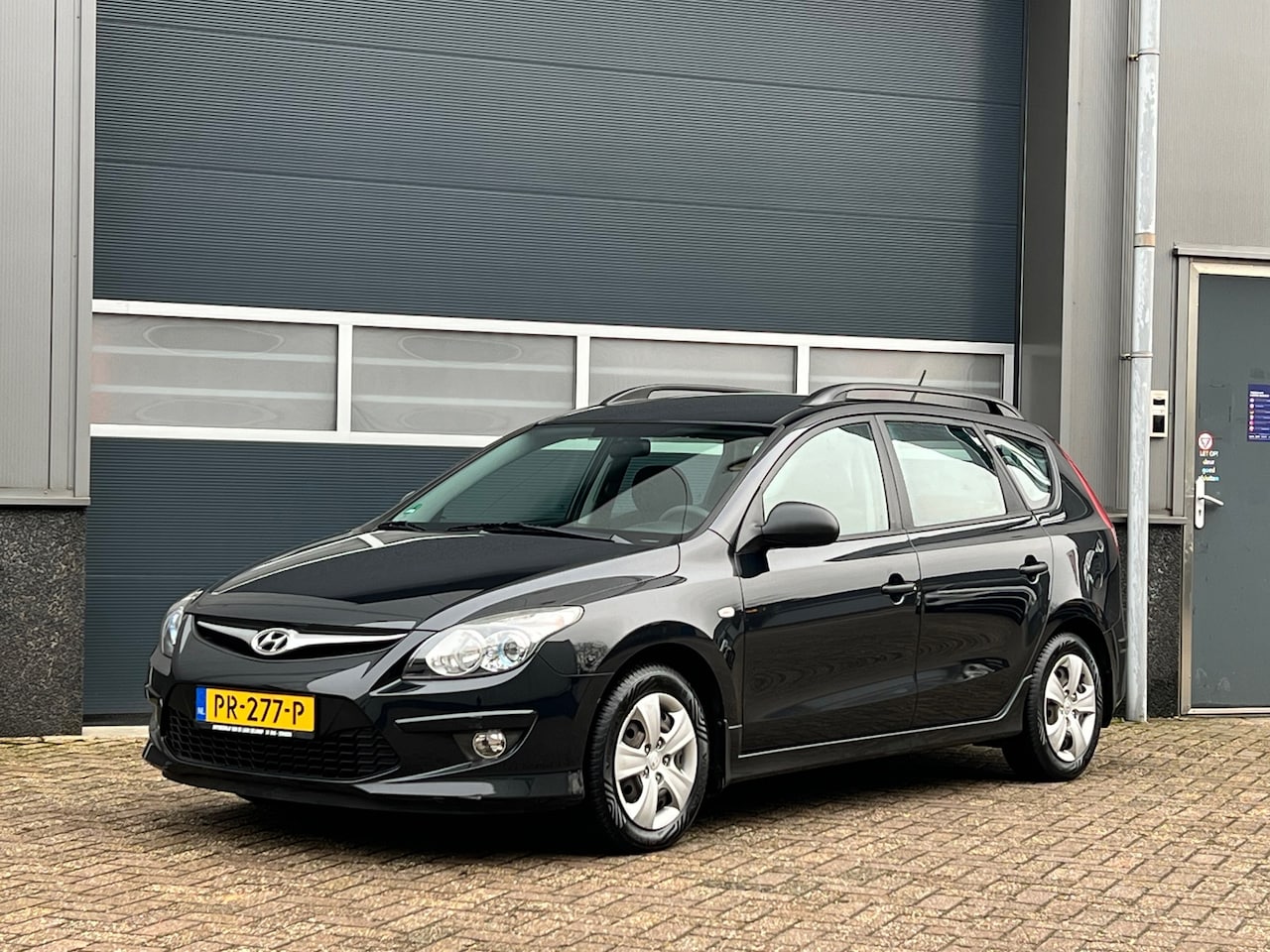 Hyundai i30 CW - 1.4i i-Drive Cool bj.2010 Airco|Trekhaak|Nette staat. - AutoWereld.nl