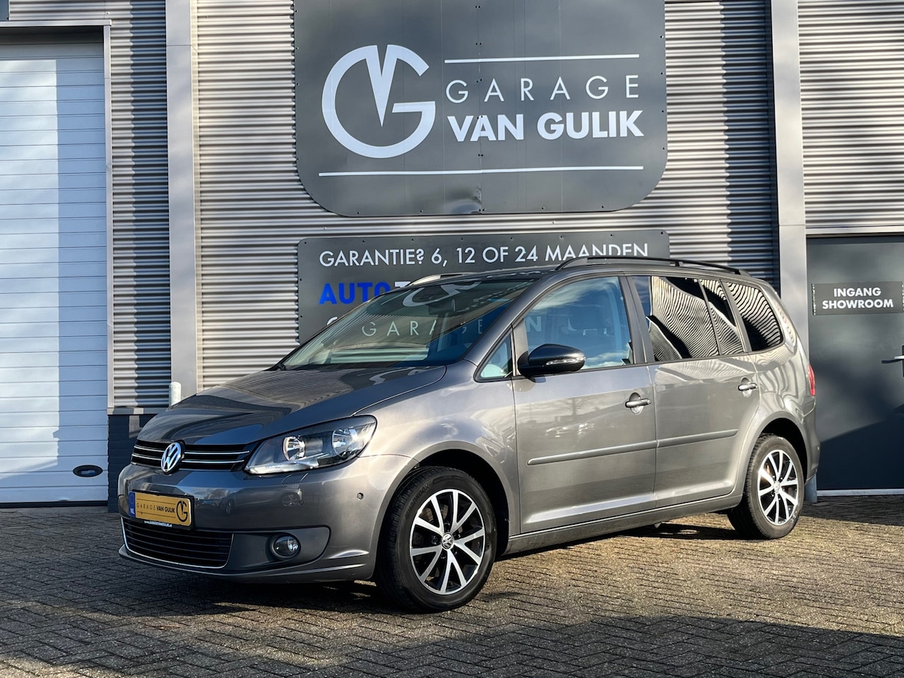 Volkswagen Touran - 1.4 TSI 140PK 7pers. Automaat Clima,Cruise,Navi,PdcV+A,Stoelverw.,Isofix,Lmv,GetintGlas,Da - AutoWereld.nl