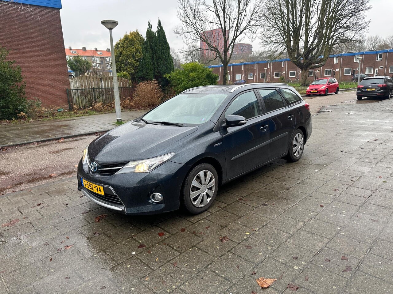 Toyota Auris Touring Sports - 1.8 Hybrid Aspiration NAP Aut Zephyr Blue - AutoWereld.nl