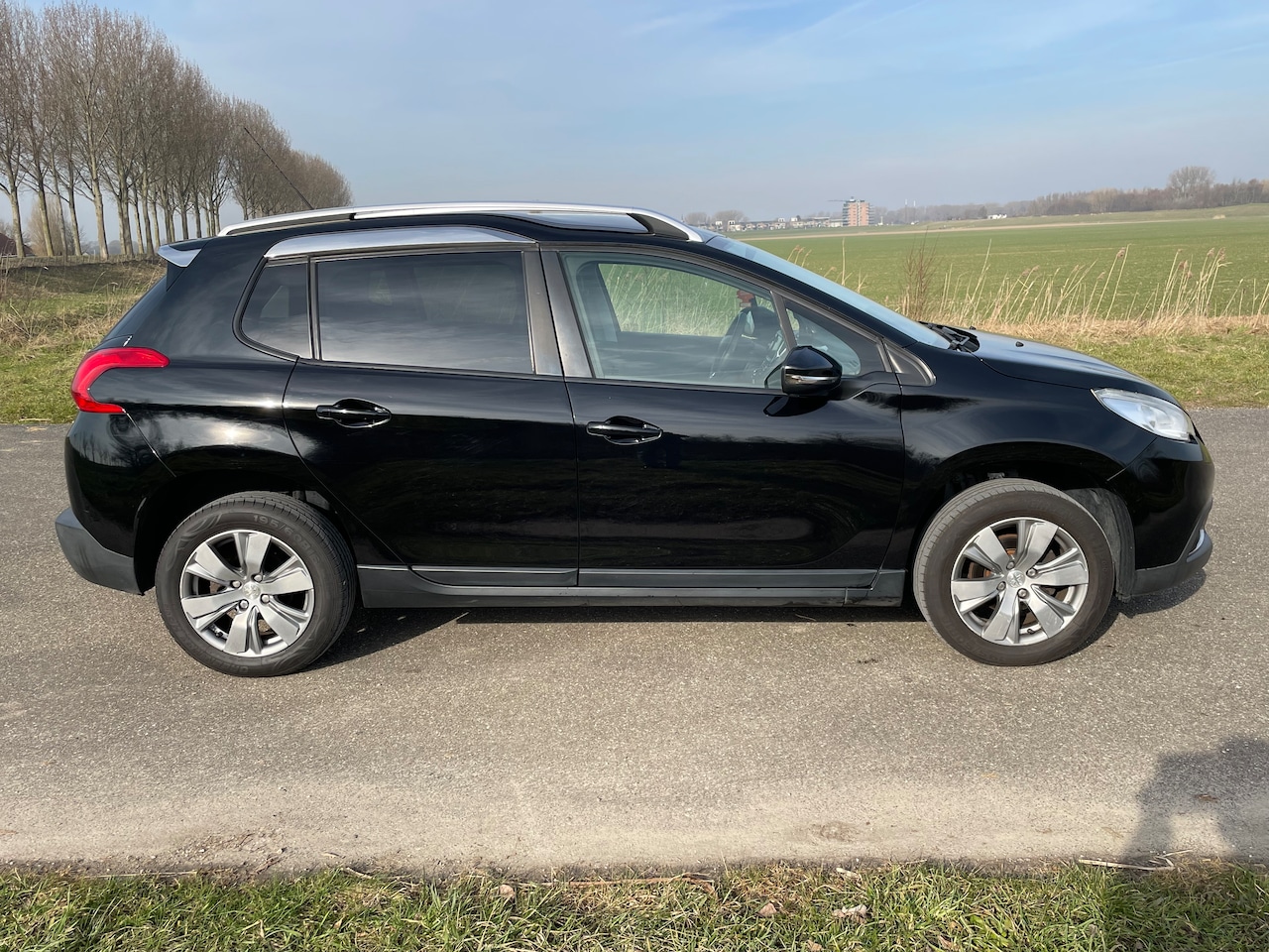 Peugeot 2008 - 1.2 PureTech Active - AutoWereld.nl