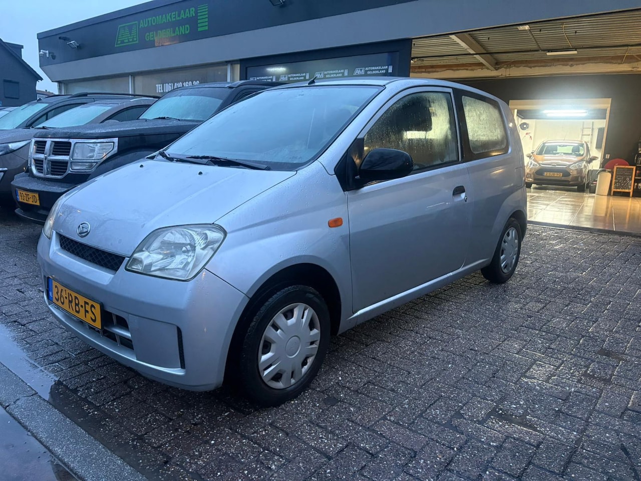 Daihatsu Cuore - 1.0-12V Kyoto | NIEUWE A{K | 12MND GARANTIE | - AutoWereld.nl